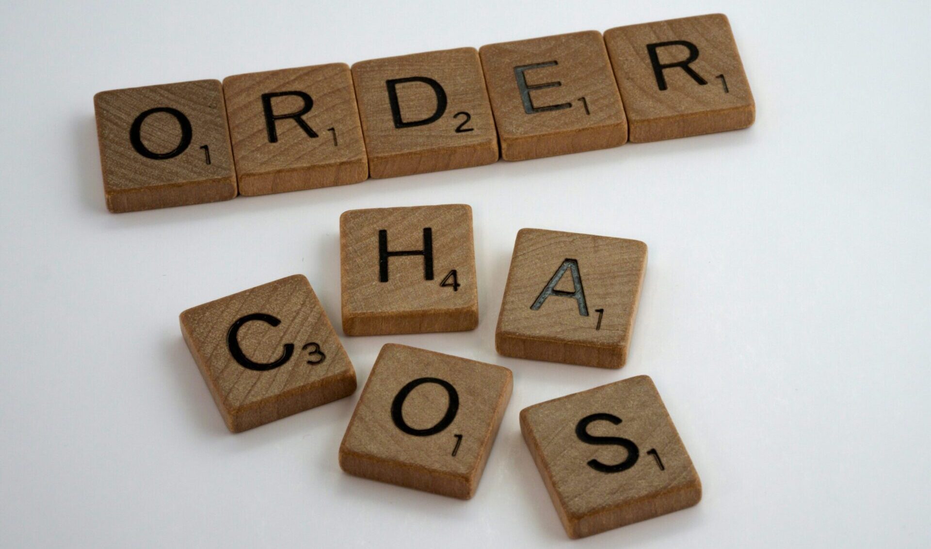 Order and chaos spelled with scrabble tiles